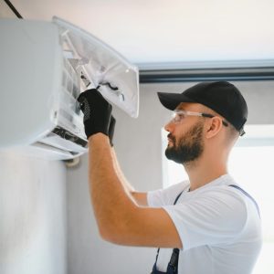 male-technicians-service-for-repair-and-maintenance-of-air-conditioners